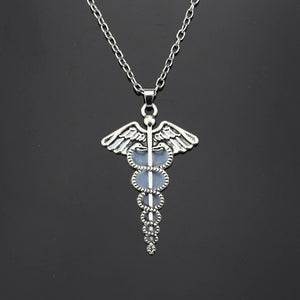 GLOW IN THE DARK ANGEL WINGS NECKLACE