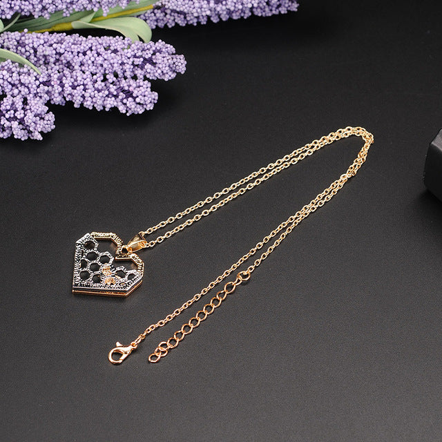 CHARMED FASHIONABLE HONEYCOMB BEE NECKLACES!
